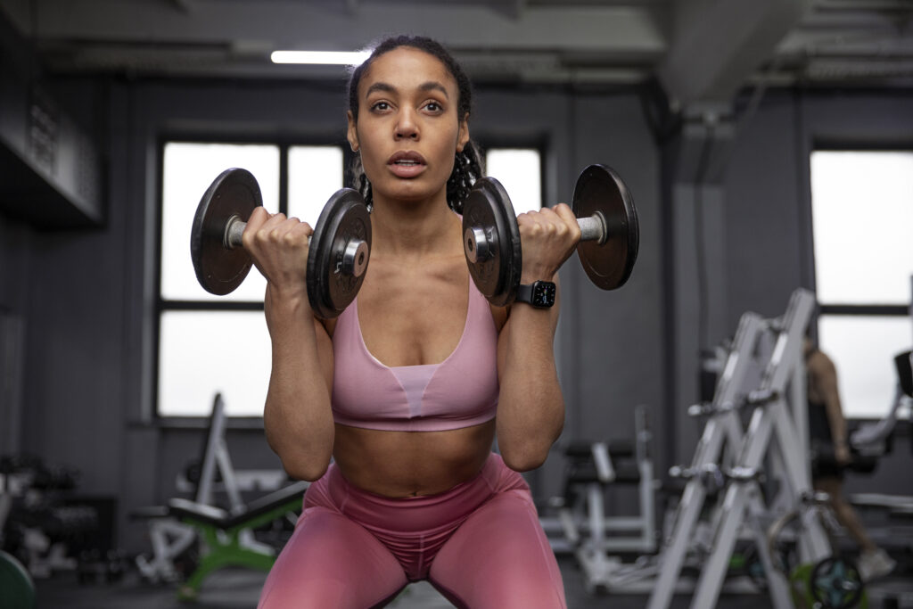 woman training weightlifting gym